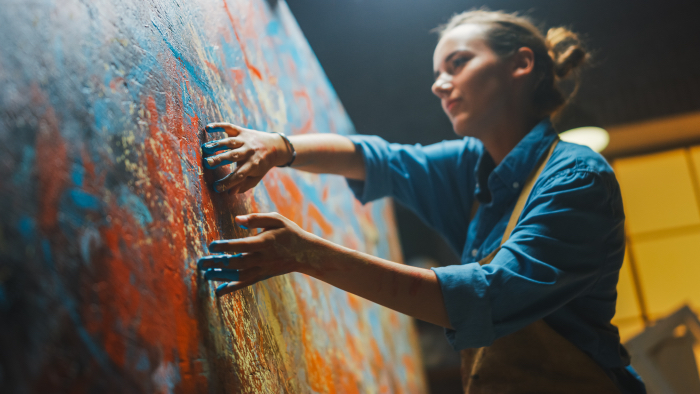 Talented Innovative Female Artist Draws with Her Hands on the Large Canvas, Using Fingers She Creates Colorful, Emotional, Sensual Oil Painting. Contemporary Painter Creating Abstract Modern Art